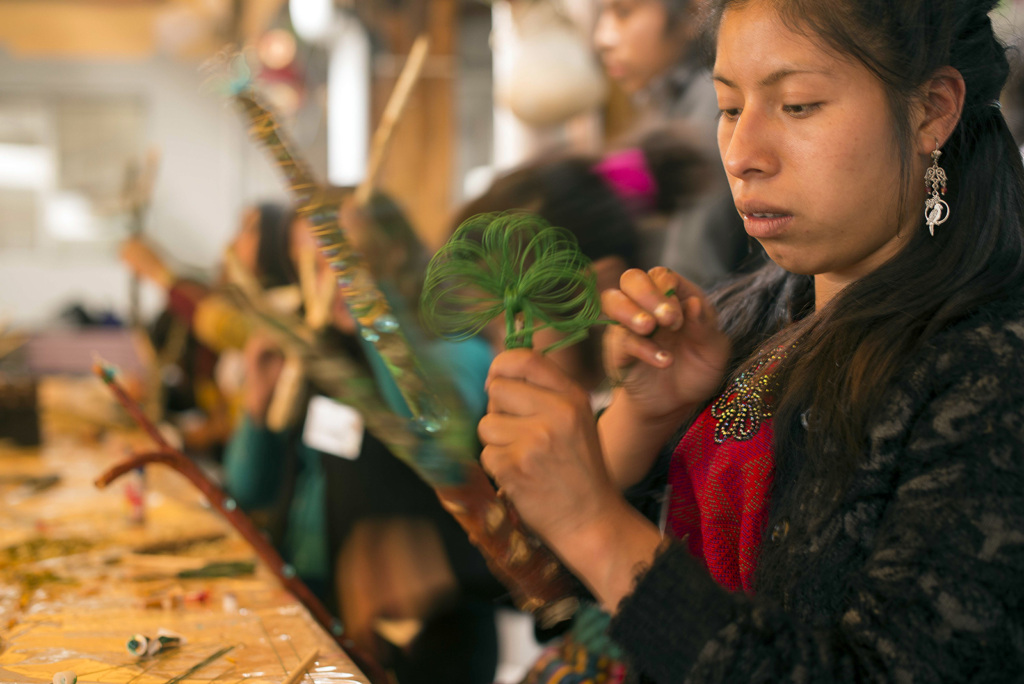 Migrant girls and women participate in indigenous artistic courses in Colectivo Vida Digna’s "Ix Kame" School for Indigenous Women in Guatemala. 