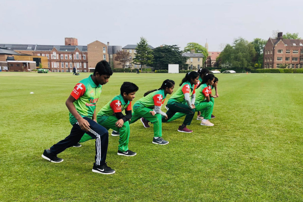 The cricket team practicing in Cambridge. © LEEDO