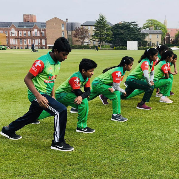 The cricket team practicing in Cambridge. © LEEDO