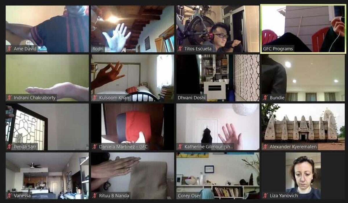 A screenshot of a Zoom meeting during which participants introduced themselves using various limbs and parts.