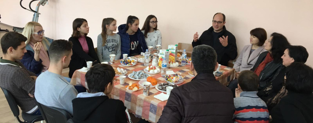 Joseph Bednarek, GFC’s Senior Director of Global Grantmaking, meeting with kids in Moldova.