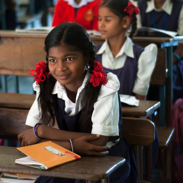 A girl in a classroom studying through LeapForWord