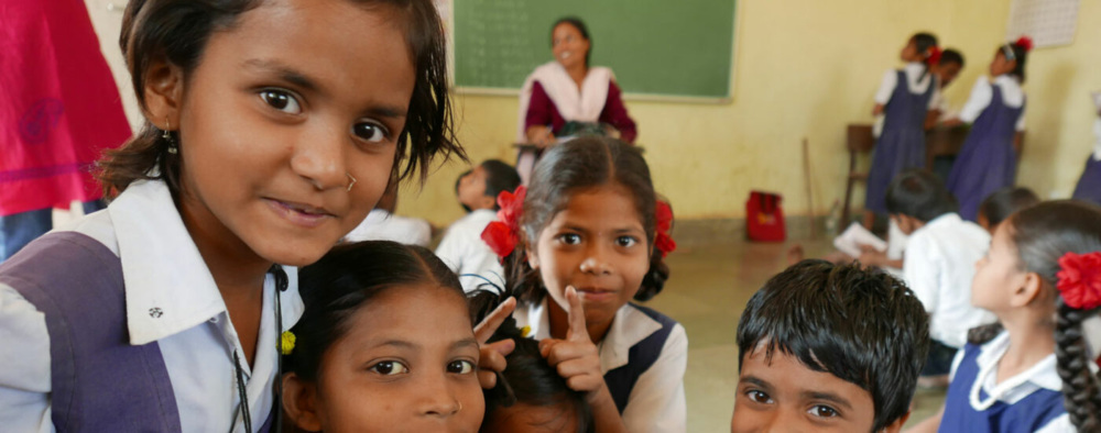 Children in a classroom studying through LeapForWord