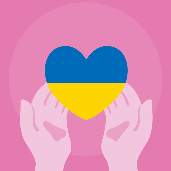 Pink hands holding a heart with the colors of the Ukrainian flag