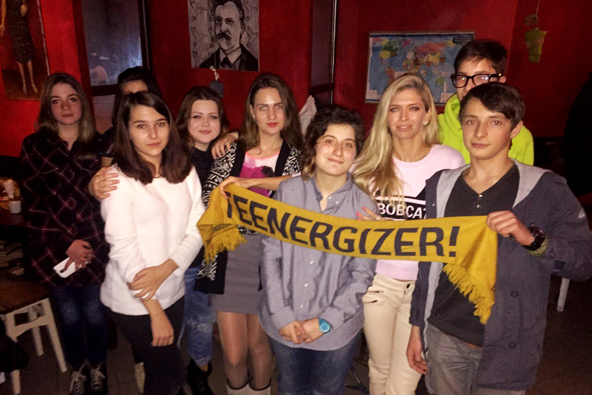 Yana (center) with members of the Teenergizer team. 