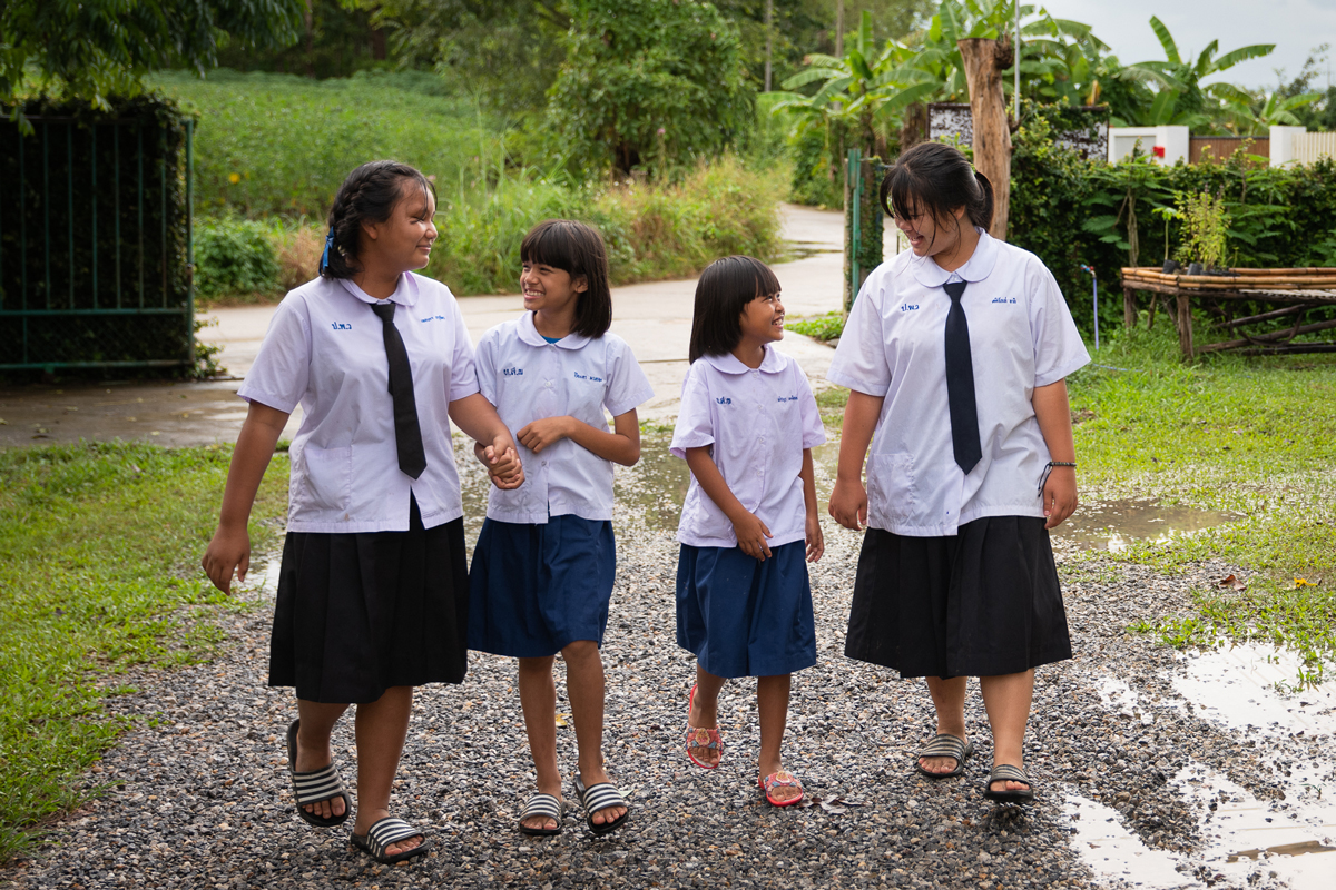 Girls walking together in Thailand