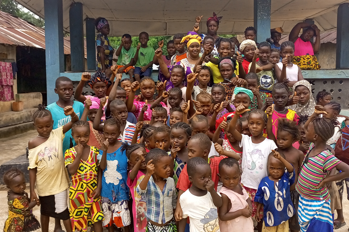 Children pose for a photo in Sierra Leone