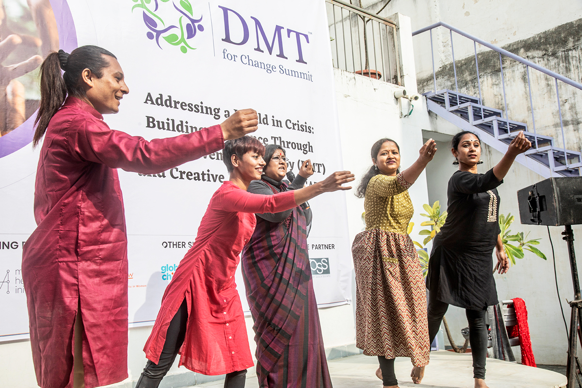 A dance performance on stage at the DMT session in India