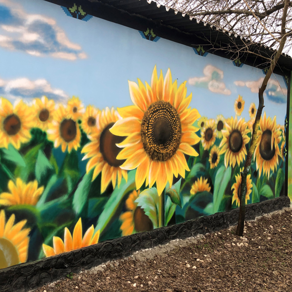 A mural of a field of sunflowers