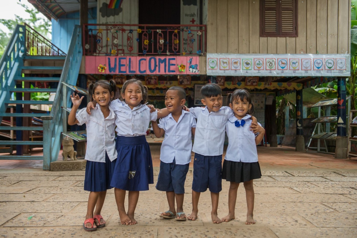 Photo of young children smiling in Cambodia