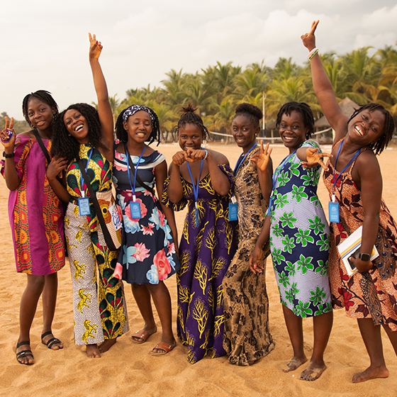 Girls posing from the 2022 Adolescent Girls Summit in Liberia.